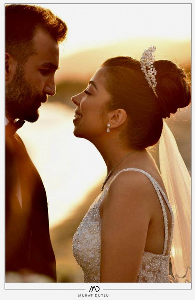 Plaj gün batımı gelin damat fotoğrafları